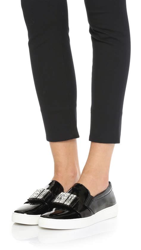 michael kors sneakers zwart wit|Michael Kors black slip on.